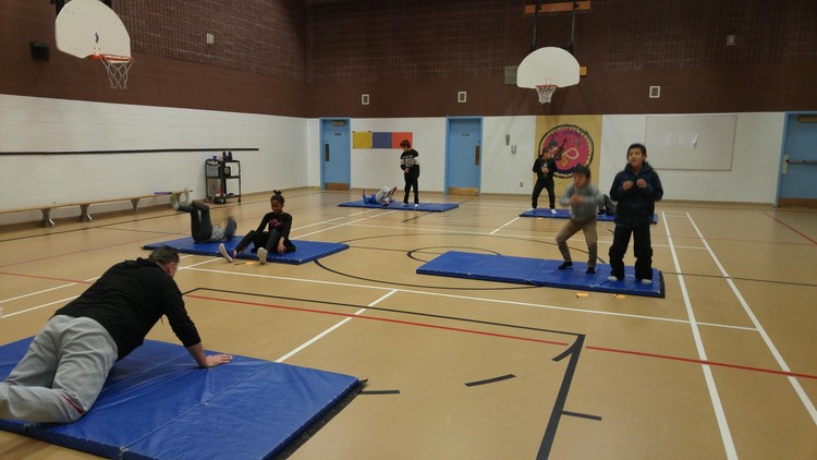 Mr. Johnson leads by example as the kids participate in ConkFit