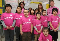 Lois Byers, Krystal Potts and Gord Atkinson join the grade 3/4/5/6 class on Pink Day!