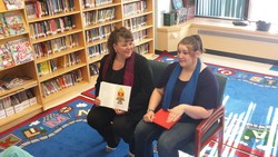 (Sheila Chartrand and her daughter Kallie share memorie with the students that inspired the books.)